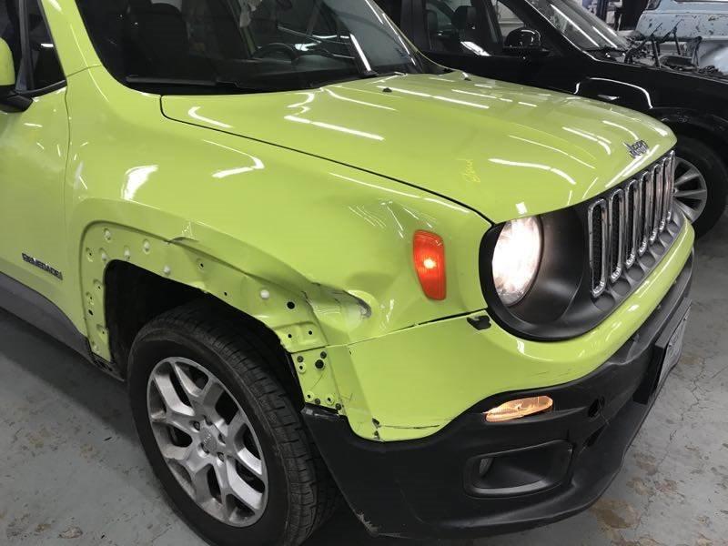 green jeep damaged